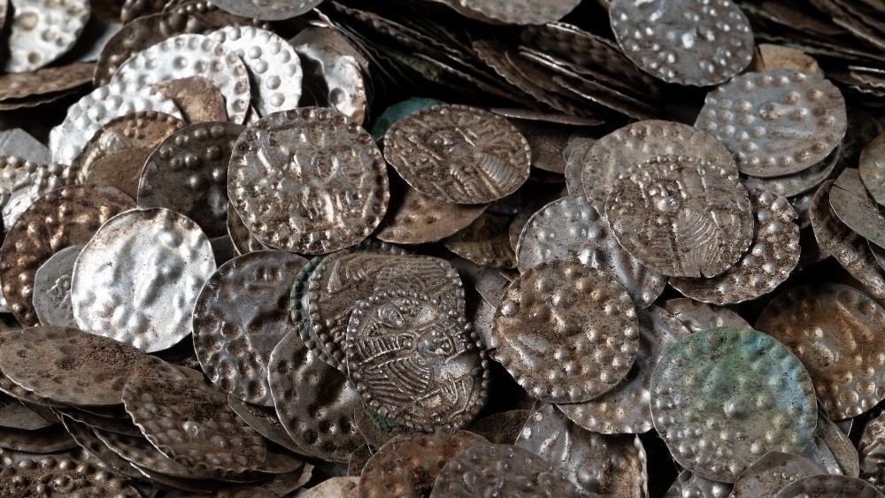 A Worm-Digger's Find That Could Rewrite Swedish History: Up to 20,000 Medieval Silver Coins Unearthed Near Stockholm