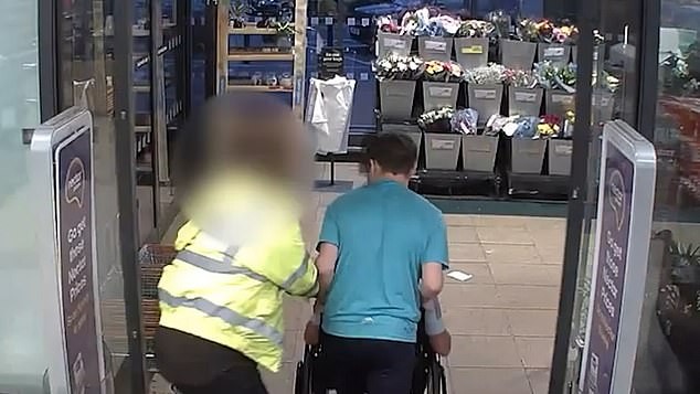 Moment shoplifter who faked being a wheelchair user jumps from his chair to assault a security guard as he is jailed for three years