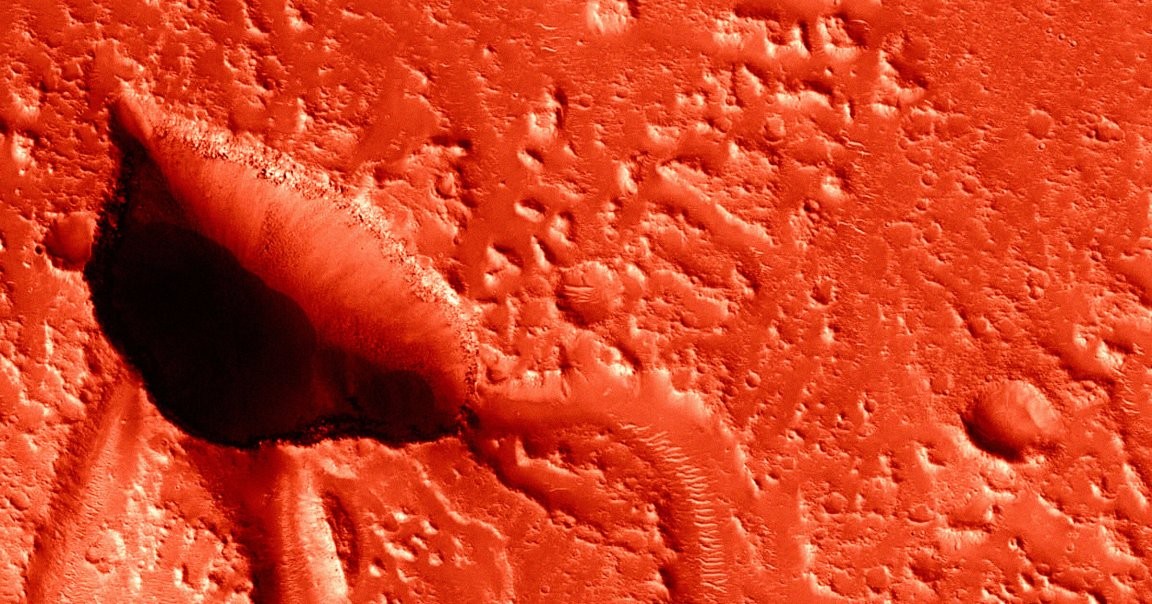 Mars Caves Carved by Water May Harbor Life