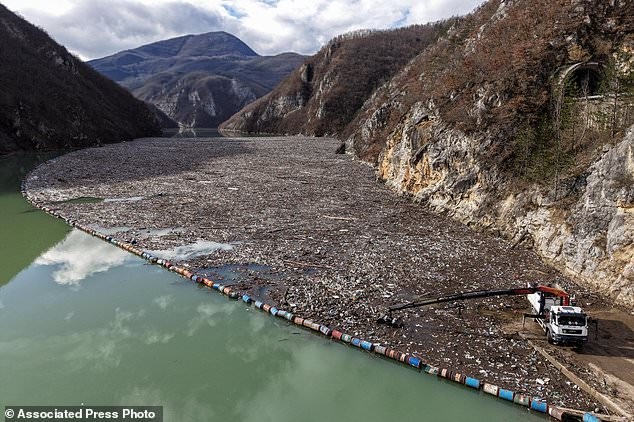 The Drina Turns Emerald Green Beneath a Mountain of Trash